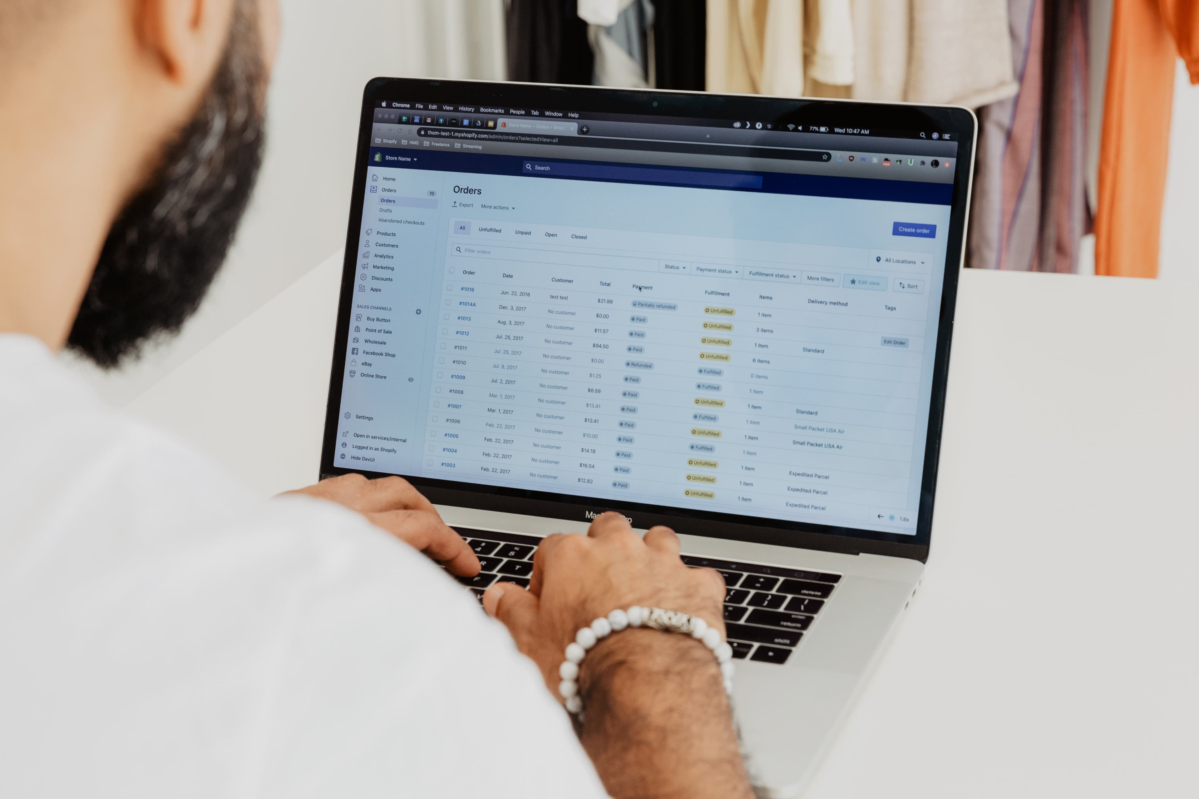 Business Owner Working on his Shopify Store